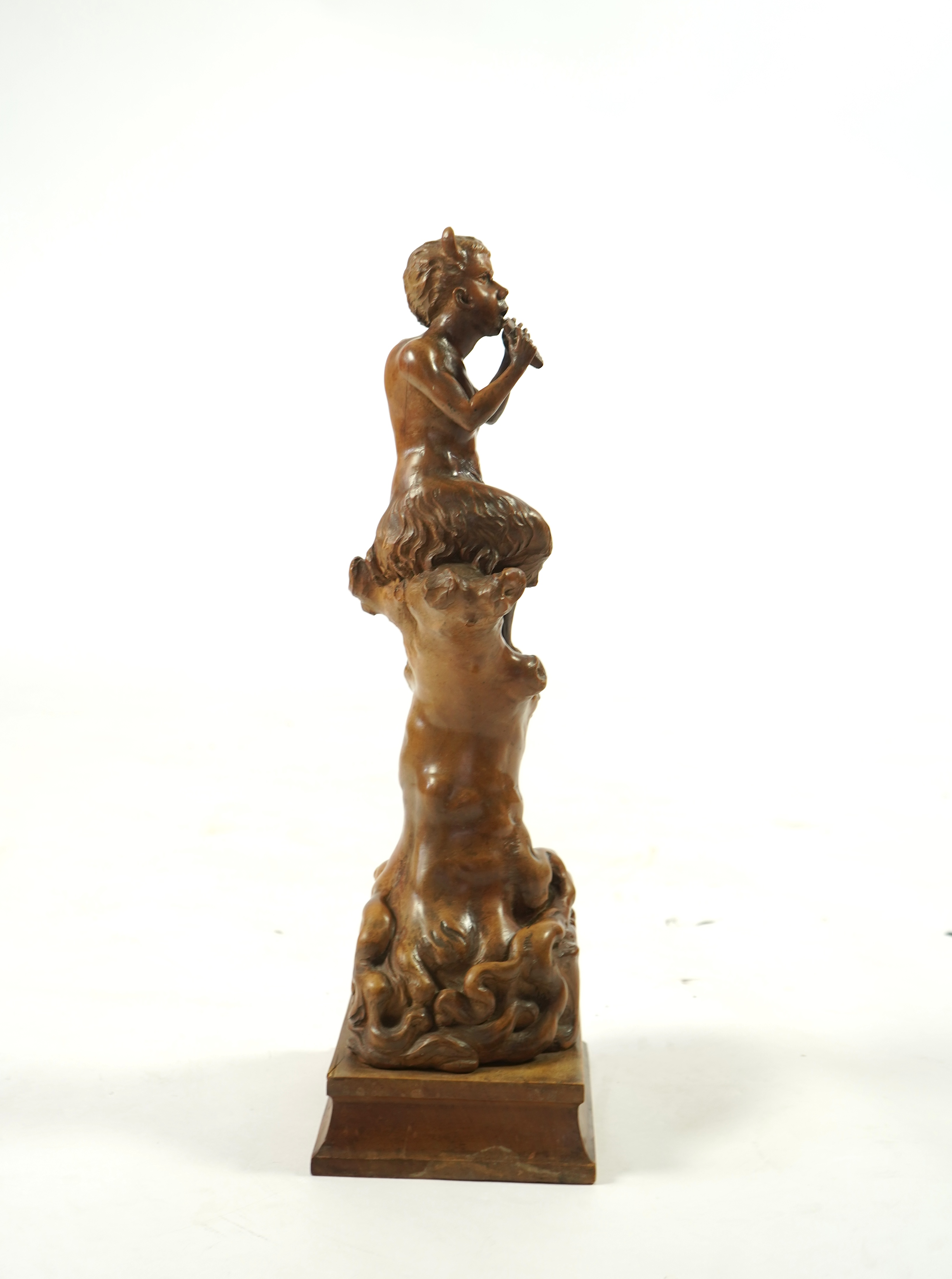 A late 19th century French carved walnut figure of Pan